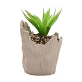Marvel Groot planter with faux green plant, detailed sculpt of Groot character from Marvel comics, perfect for decorative display.