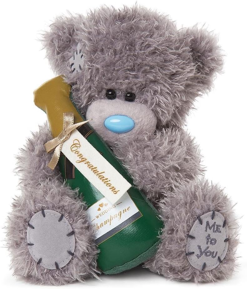 Carte Blanche Tatty Teddy Bear soft toy holding a champagne glass, ideal as a wedding or congratulation gift.