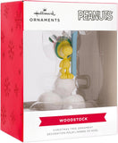 Hallmark Woodstock Peanuts resin Christmas ornament hanging on a decorated tree.