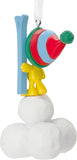 Hallmark Woodstock Peanuts resin Christmas tree ornament hanging on a decorated holiday tree.