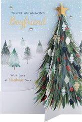 Hallmark boxed Christmas greeting card for boyfriend featuring a classic winter scene with a decorated Christmas tree.