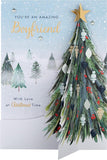 Hallmark boxed Christmas greeting card for boyfriend featuring a classic winter scene with a decorated Christmas tree.