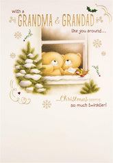 Hallmark Christmas greeting card for Grandma and Grandad with open verse and festive design, featuring holiday-themed illustrations.