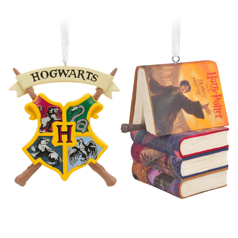 Hallmark Harry Potter Christmas ornaments featuring Hogwarts crest and stacked books with wand, set of 2.