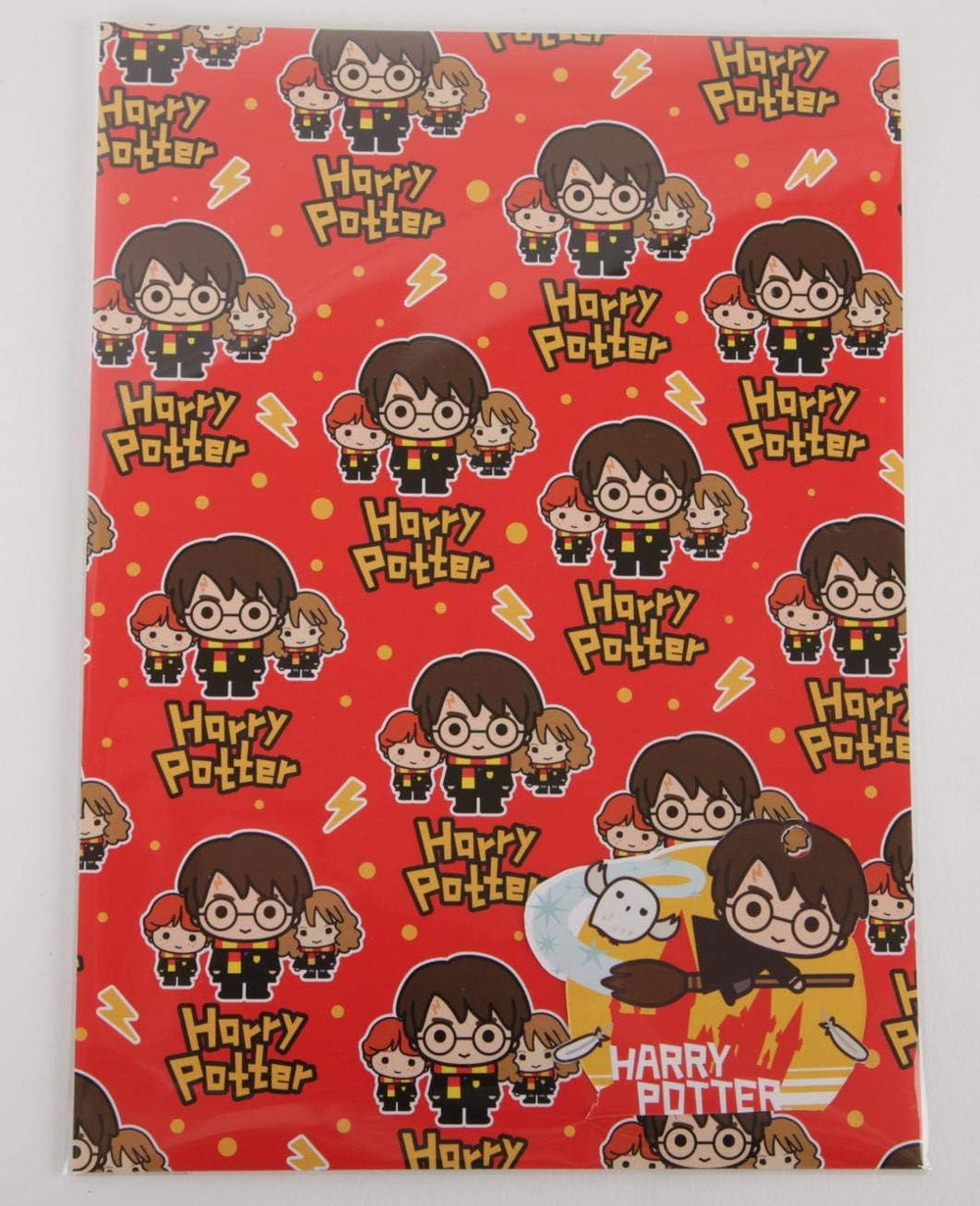 Hallmark Harry Potter gift wrap with two sheets and two matching gift tags, featuring magical Harry Potter-themed designs.