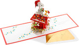 Hallmark 3D pop-up Christmas card featuring Snoopy and Woodstock from Peanuts in festive holiday design.