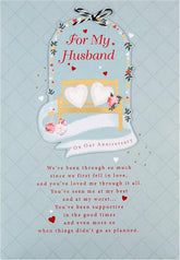 Hallmark anniversary greeting card for husband with classic illustrated design and heartfelt verse, perfect for celebrating love.