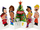 Hallmark Christmas greeting card featuring 3D pop-up Peanuts characters Charlie Brown, Snoopy, and a Christmas tree.