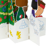 Hallmark 3D pop-up Christmas card featuring Peanuts characters Charlie Brown and Snoopy with a decorated Christmas tree.