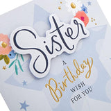 Hallmark birthday greeting card with floral and star design, featuring a heartfelt message for sister.