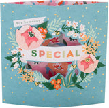 Hallmark Someone Special die-cut floral design greeting card with intricate flower patterns and heartfelt message inside.
