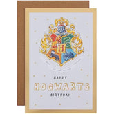 Hallmark Harry Potter Hogwarts House Crest birthday greeting card featuring house symbols and vibrant colors.