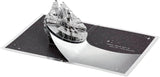 Hallmark 3D pop-up Star Wars Millennium Falcon space-themed silver birthday card with intricate design and vibrant details.