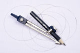 Helix Oxford metal compass set with pencil for drawing and measuring, featuring a sturdy metal construction.