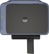 HP Deskjet 2921 printer sitting on a desk, showcasing its compact design and control panel in a home office setting.