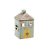 Joe Davies Village Pottery blue house tealight holder with intricate village design and warm blue finish.