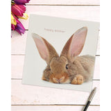 Colorful UK Greetings Easter greeting card for kids featuring a cute bunny design on a 159x159mm size.
