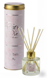 Lily-Flame Fairy Dust Reed Diffuser for home fragrance with decorative bottle and reed sticks, enhances room scent and ambiance.
