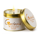 Lily-Flame Gardenia scented tin candle for home fragrance, featuring a decorative design and a metal tin container.