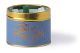 Lily-Flame Blue Hyacinth scented tin candle with a floral design and blue packaging, perfect for home fragrance.