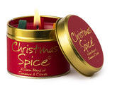 Lily-Flame Christmas Spice scented tin candle with festive red and gold design, showcasing the candle inside the decorative tin.