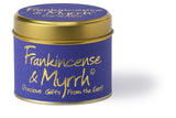 Lily-Flame Frankincense & Myrrh scented tin candle with a decorative label, perfect for aromatic home decor.