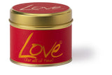 Lily-Flame Love scented tin candle with a decorative label, showcasing a cozy, handcrafted design perfect for home decor.