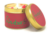 Lily-Flame Rhubarb scented tin candle with a decorative label, designed for home fragrance and ambiance.