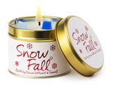 Lily-Flame Snow Fall scented tin candle with festive winter design and cozy fragrance in a small metal container.