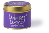Lily-Flame Winter Wood scented tin candle with a festive label, featuring a cozy winter scene and natural wood fragrance.
