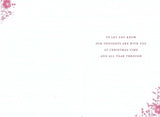 Thinking of You at Christmas greeting card by NQ featuring festive Christmas anemone flower design.