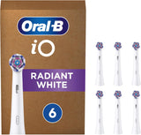 Six Oral-B iO Radiant White replacement brush heads in white for electric toothbrushes, shown in a 6-pack.