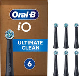 Six black Oral-B iO Ultimate Clean replacement brush heads for electric toothbrushes, arranged in a pack.