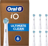 Six white Oral-B iO Ultimate Clean replacement brush heads for electric toothbrushes, shown in a six-pack arrangement.