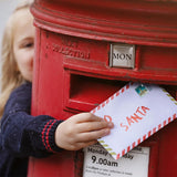 Royal Mail Christmas 2nd Class stamps in an 8-pack, featuring festive holiday designs for mailing during the Christmas season.