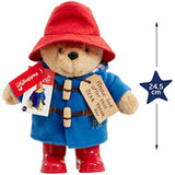Rainbow Designs Paddington Bear soft toy wearing yellow boots, plush Paddington character with a friendly expression and colorful scarf.
