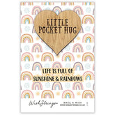 Second Nature keepsake gift featuring a colorful rainbow and sunshine design on a small pocket hug wish token.
