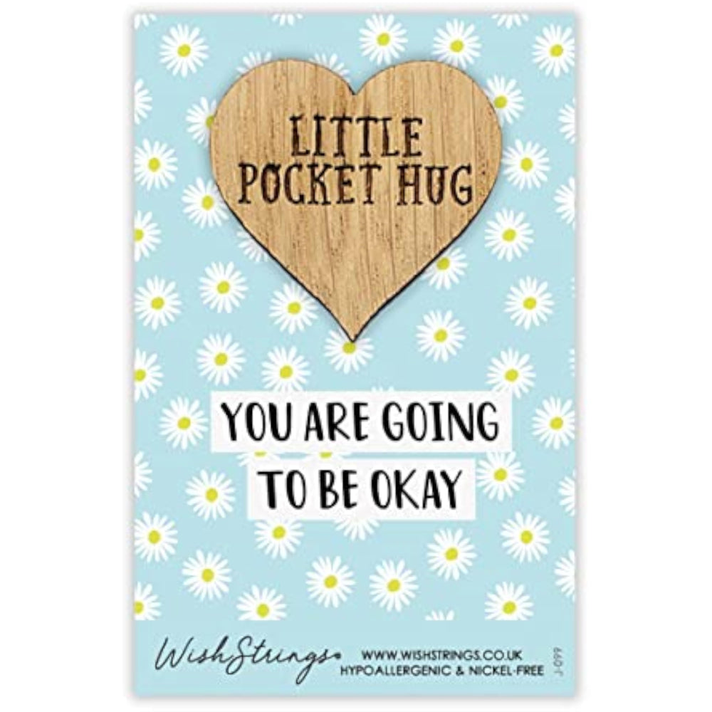 Second Nature keepsake gift with a small pocket hug wish token featuring motivational message on a light background.