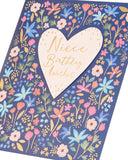 UK Greetings birthday card for niece featuring a bright floral design with colorful flowers and cheerful birthday message.