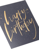 UK Greetings Black and Gold Design Birthday Card featuring elegant gold accents on a black background.