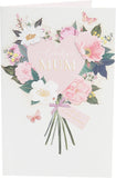 UK Greetings birthday greeting card for mum with pink floral design, featuring cheerful floral artwork on the front.