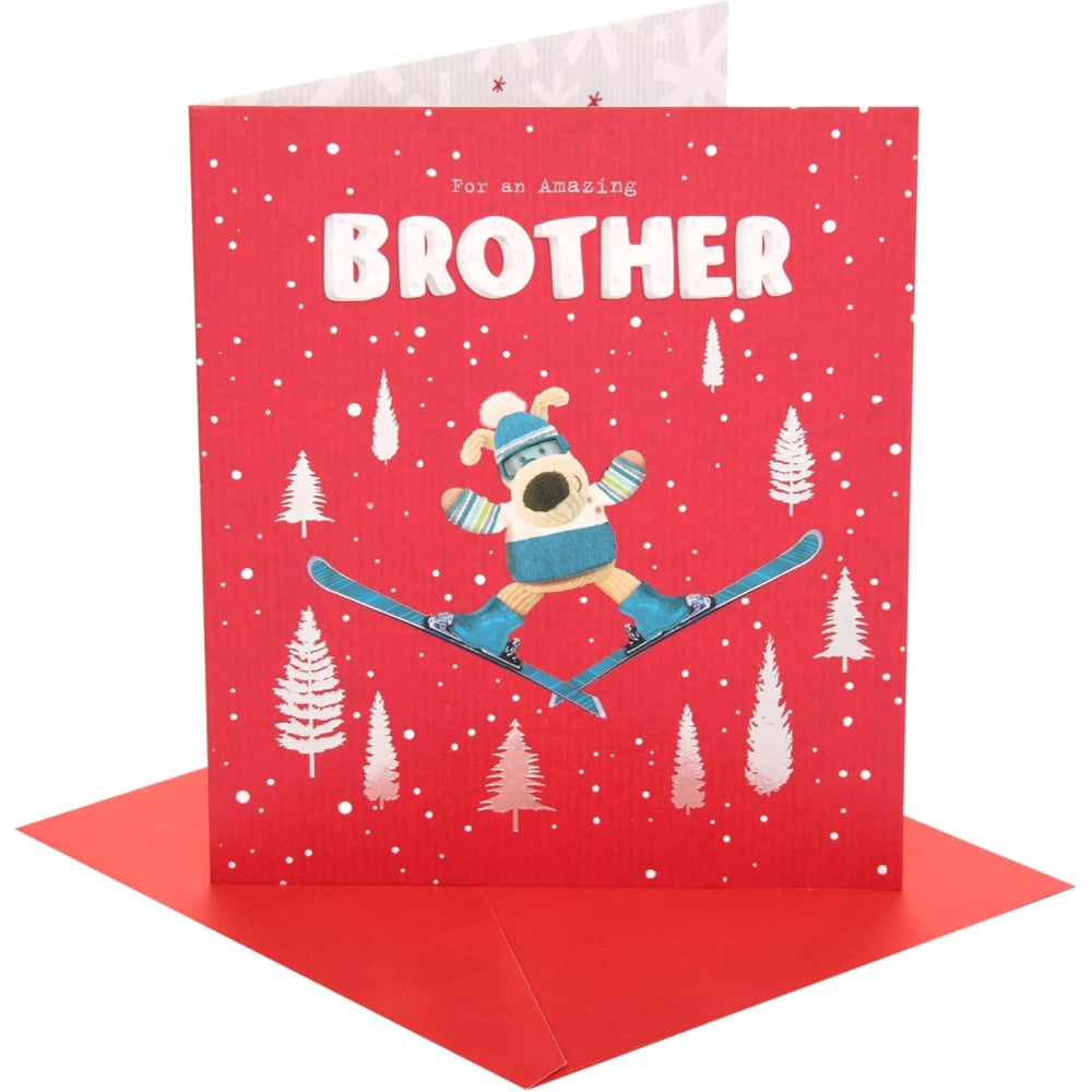 UK Greetings Boofle skiing brother Christmas card featuring festive holiday illustration with cheerful design and seasonal greetings.