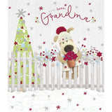 UK Greetings Christmas card featuring Boofle holding a flower pot, designed for Grandma, with festive holiday imagery.