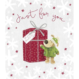 UK Greetings Boofle Christmas card with gift illustration, featuring festive holiday design and cheerful character for the season