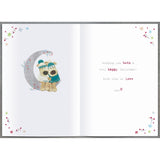 UK Greetings Boofles Christmas card featuring Boofles sitting on a moon with his brother and girlfriend, festive holiday design
