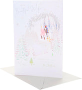 UK Greetings Christmas card for wife featuring a beautiful snow scene with festive holiday imagery