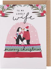 UK Greetings Wife Penguin Snow Globe featuring glitter, a heartfelt message, and a cute Christmas gift display.