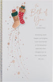 UK Greetings Christmas greeting card featuring festive stockings design, suitable for sending holiday wishes to loved ones.