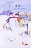 UK Greetings Christmas greeting card featuring a festive snowcouple design, perfect for sharing holiday cheer.