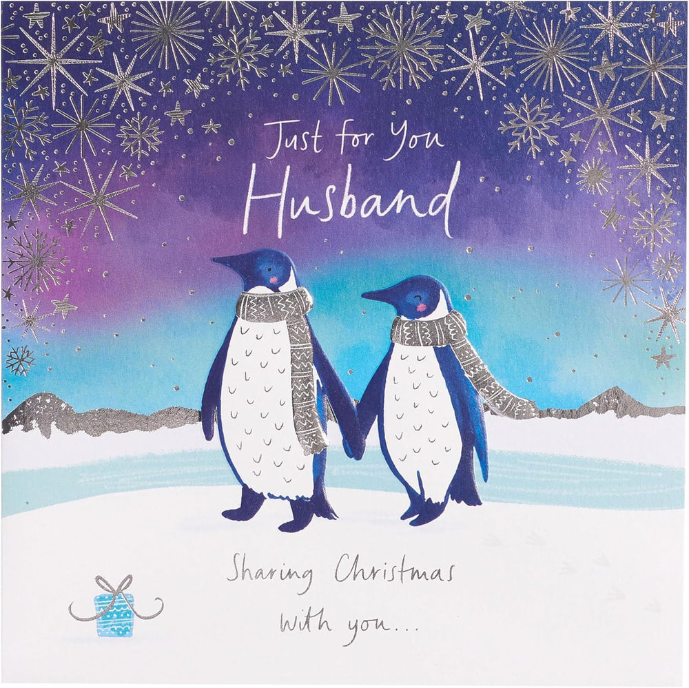 UK Greetings Christmas greeting card for husband featuring adorable penguins and romantic festive design, perfect for holiday cheer.
